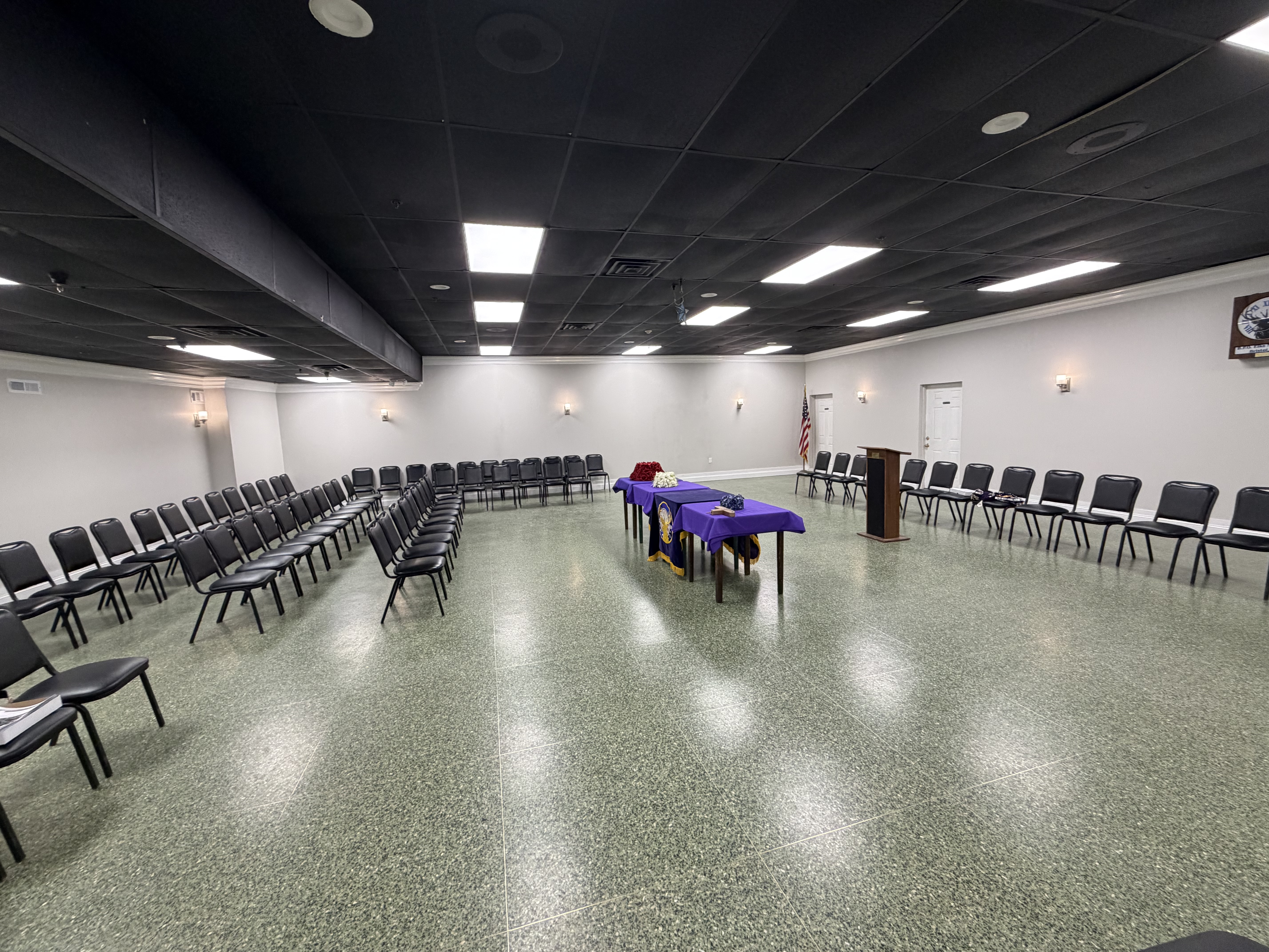 Bristol Elks hall arranged with rows of chairs for a gathering